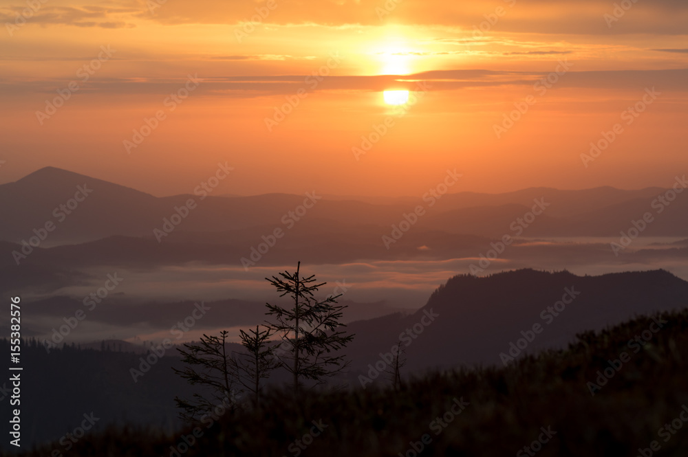 Fototapeta premium Beautiful mountain landscape. Sunrise over the mountain range.