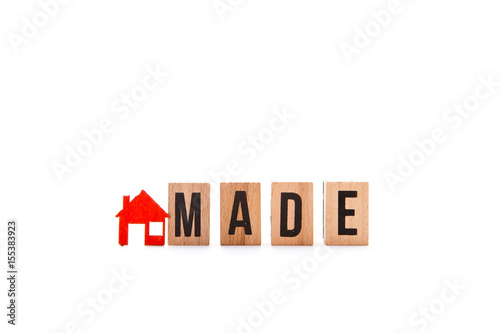 Home Made - block letters with red home   house icon with white background  
