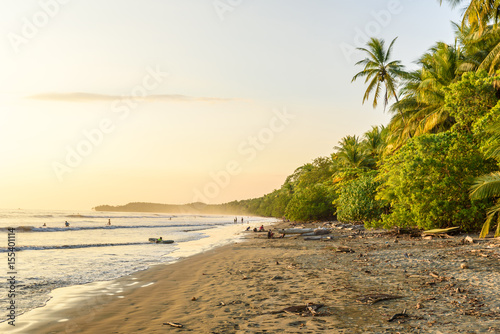 Sunset at paradise beach in Uvita  Costa Rica - beautiful beaches and tropical forest at pacific coast of Costa Rica - travel destination in central america