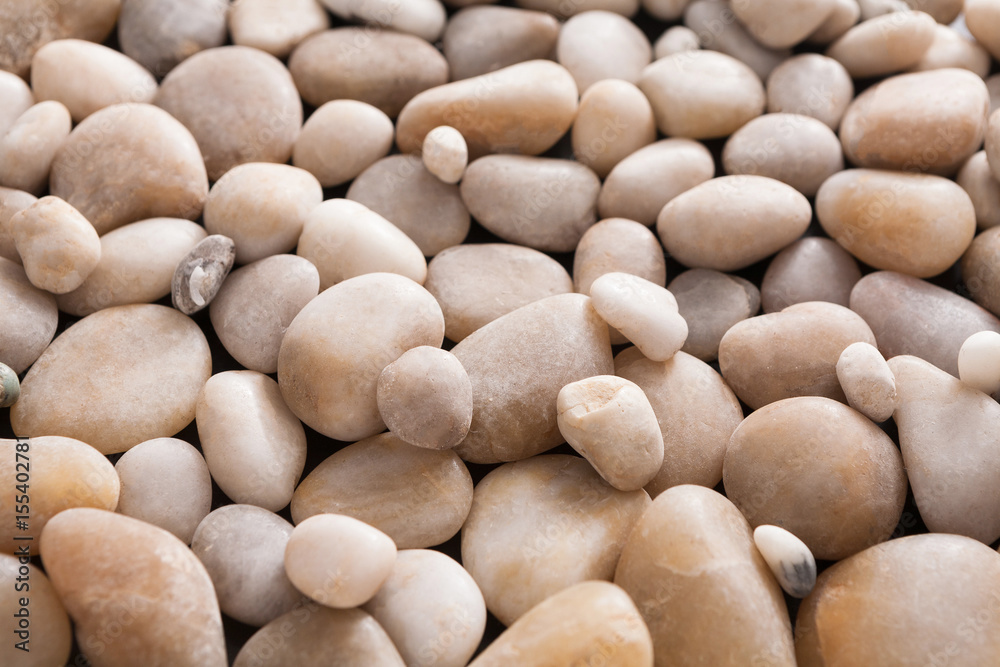 Sea pebbles background, natural seashore stones Sea pebbles background, natural seashore stones