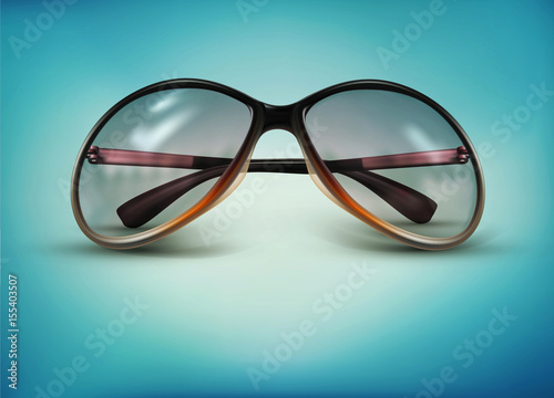 Vector sunglasses isolated on a blue background © Alkestida