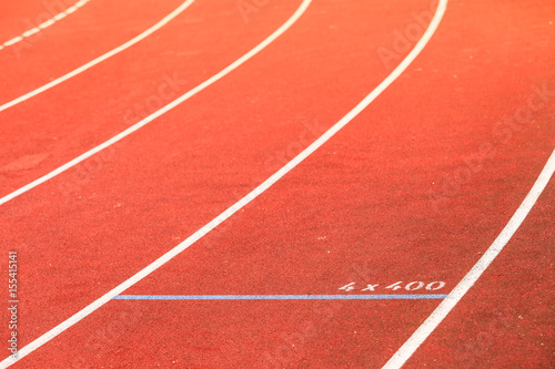 Red running track in stadium. © Voyagerix