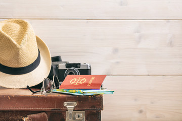 Travel concept on wooden background - copy space