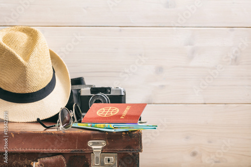 Travel concept on wooden background - copy space