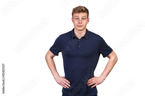 Man in navy polo t-shirt on white background with smile.