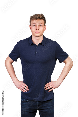 Man in navy polo t-shirt on white background with smile.
