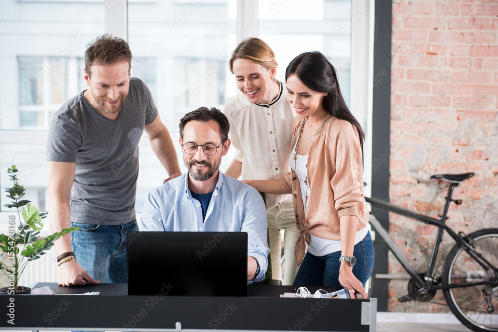 Happy smiling workers in office