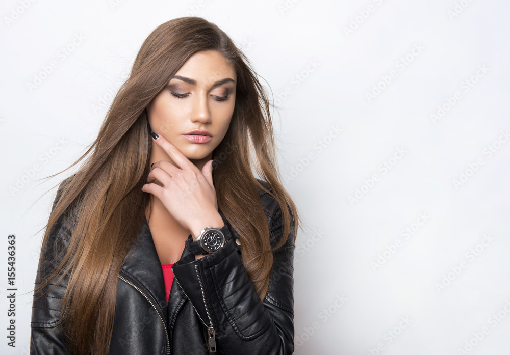 beautiful young woman with long hair posing with wrist watch beautiful young woman with long hair posing with wrist watch