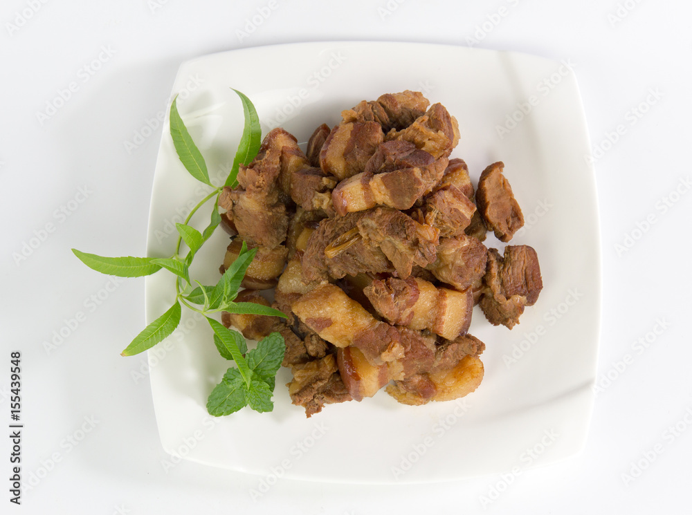 chinese food soy-stewed pork on white plate isolated on white background
