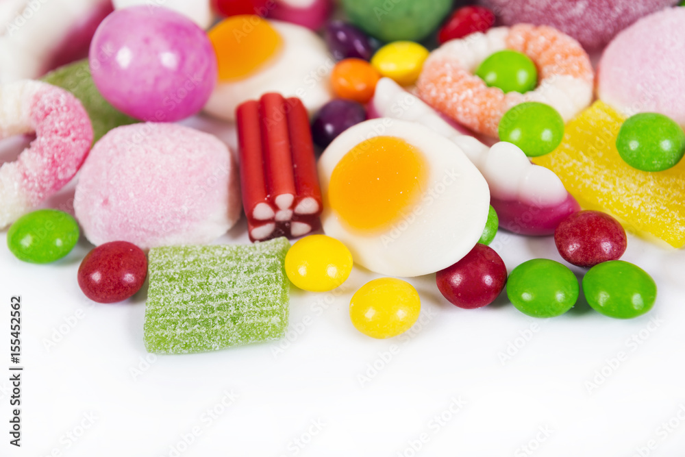 Mixed colorful candies isolated on white Mixed colorful candies isolated on white