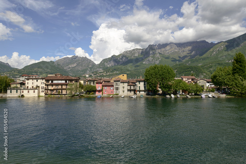 houses on Adda riverbank , Italy