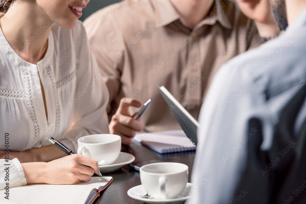 business team on meeting discussing project in cafe, business lunch concept business team on meeting discussing project in cafe, business lunch concept