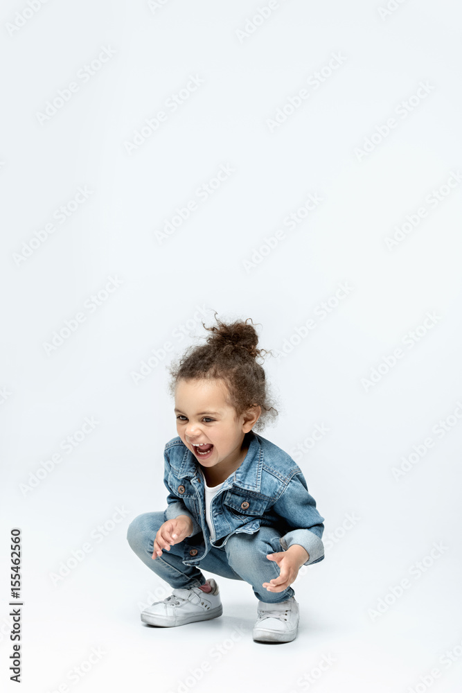 funny little kid girl in jeans isolated on white funny little kid girl in jeans isolated on white
