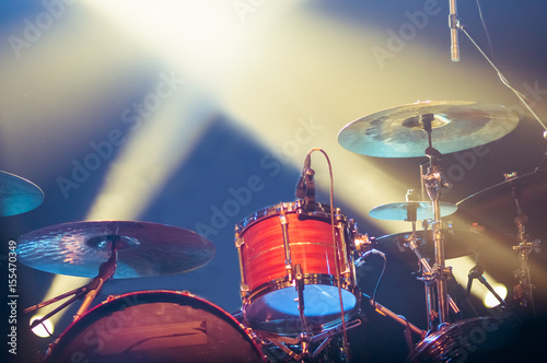 Drum kit on stage in the spotlight color