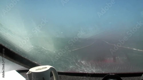 Storm from the window of a fishing boat in New Zealand. Extreme work. Large destructive waves.