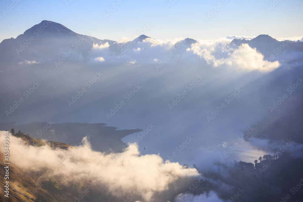 Cloudy and mist in Mountain Rinjani, active volcano at Lombok island of Indonesia Cloudy and mist in Mountain Rinjani, active volcano at Lombok island of Indonesia
