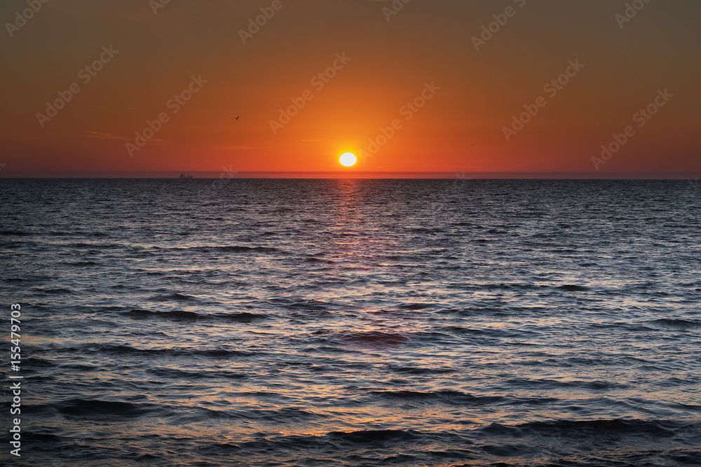 Sunset in Baltic sea.