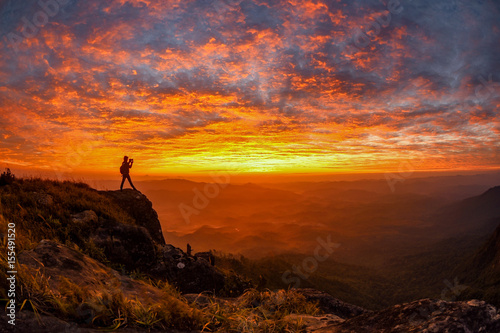 sun over mountain mist in sunrise,mist on sunrise,mist over mountain during sunrise