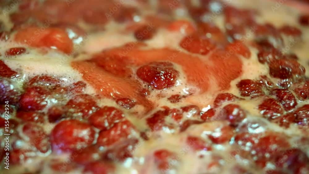 Cooking delicious strawberry jam closeup Cooking delicious strawberry jam closeup