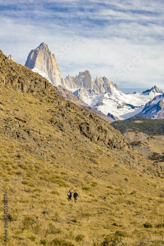 Two Men walking at Trekking Road. El Chalten - Argentina