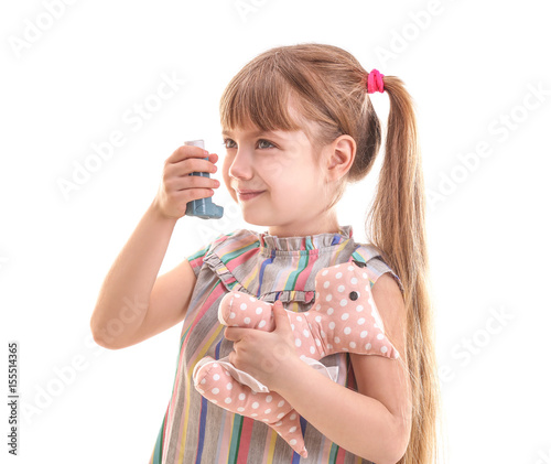 Cute little girl holding to...