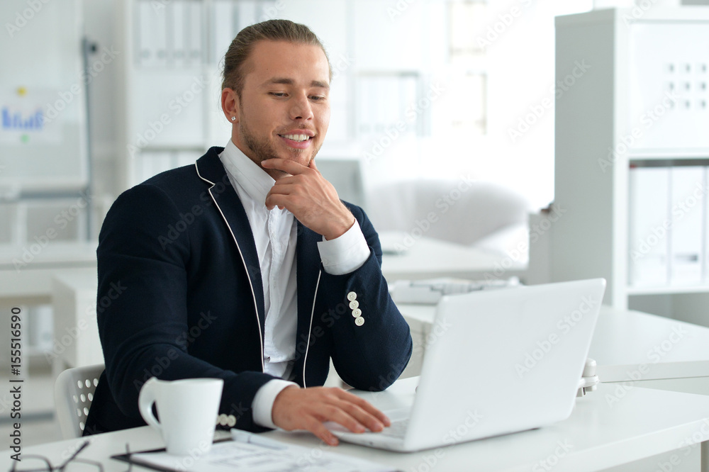 Businessman at the desk working Businessman at the desk working