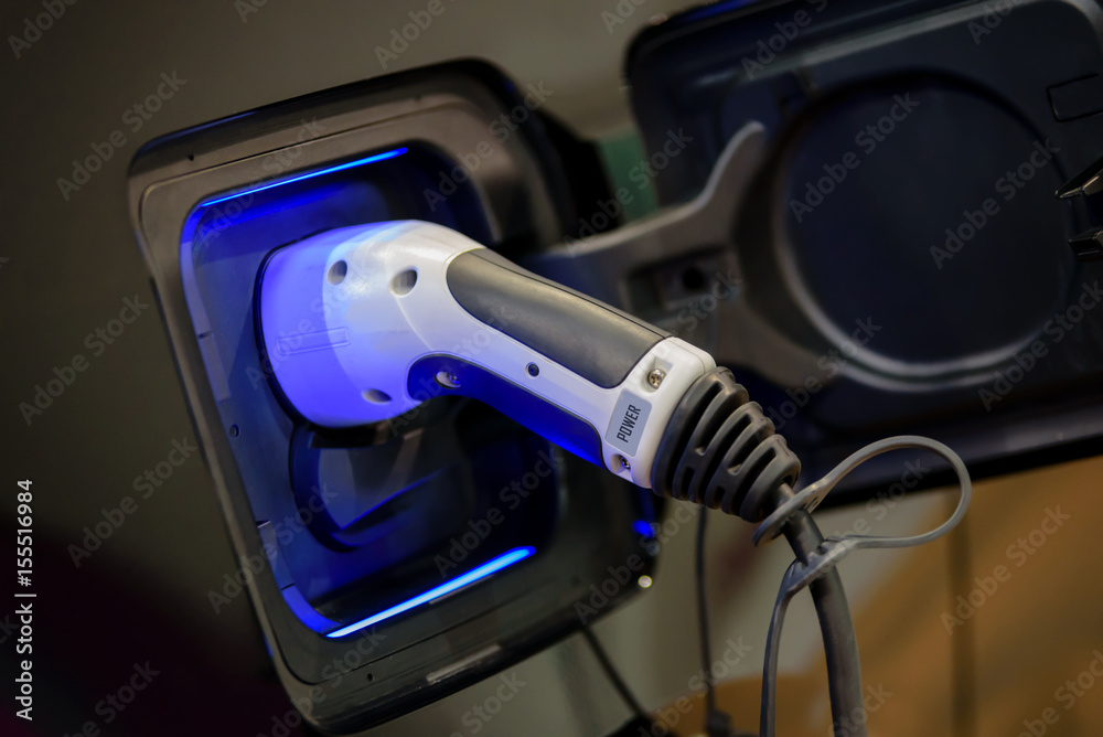 Charging an electric car Charging an electric car