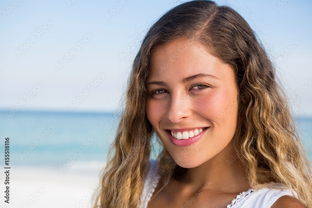 Portrait of beautiful smiling woman at beach Portrait of beautiful smiling woman at beach