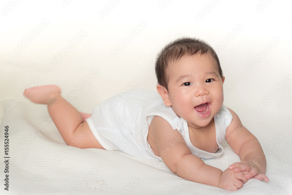 portrait of asian baby isolated on the bed portrait of asian baby isolated on the bed