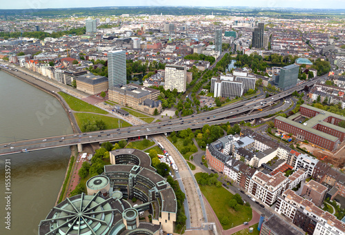 High top view of city buildings and motorway from Dusseldorf Rhine Tower. Germany