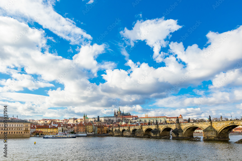Aerial view of Charles Bridge (Karluv Most) over the Vltava river. This is a famous historic and touristic bridge in Prague.