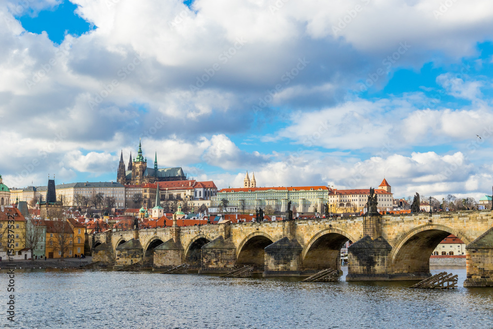 Obraz premium Aerial view of Charles Bridge (Karluv Most) over the Vltava river. This is a famous historic and touristic bridge in Prague.