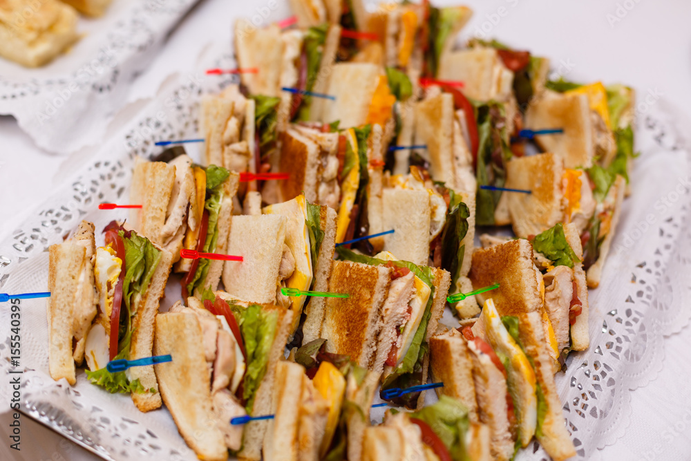 Mini Club Sandwich with chicken beacon ham, Egg Salad Cold Cuts Brioche  Sandwiches for Catering, Seminar, Coffee Break, Breakfast, Lunch, Dinner,  Buffet and meeting Group. Photos | Adobe Stock