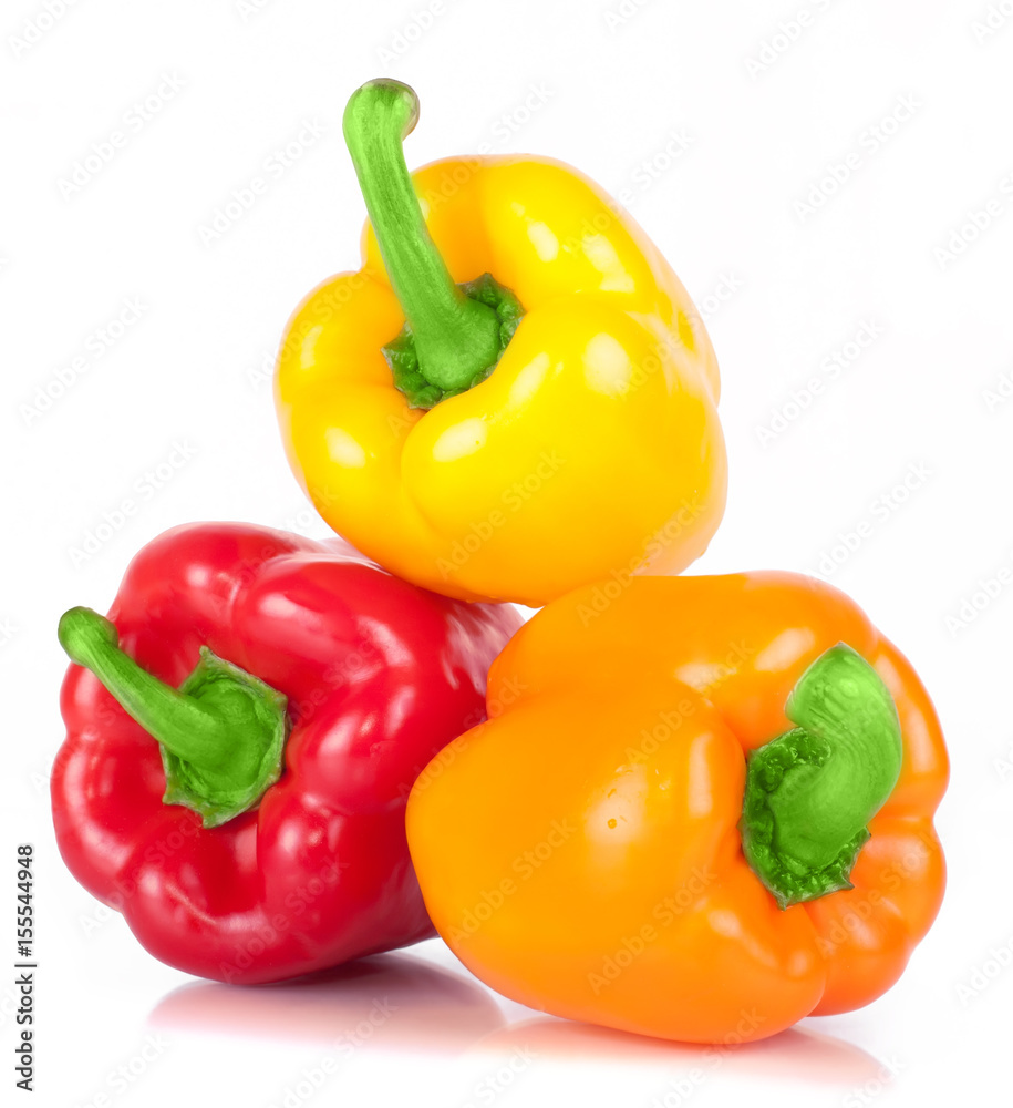 .three sweet pepper red, orange, and yellow with bright green стрволом with white light and the water drops diet pepper, isolated on white background .three sweet pepper red, orange, and yellow with bright green стрволом with white light and the water drops diet pepper, isolated on white background