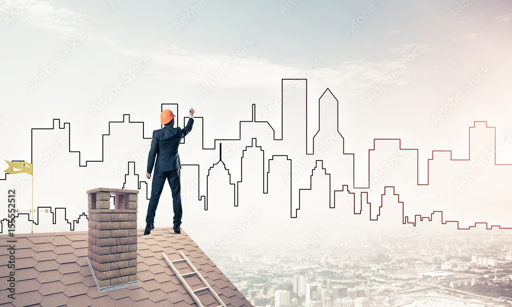 Man architect draw silhouette of modern city on blue sky. Mixed Man architect draw silhouette of modern city on blue sky. Mixed