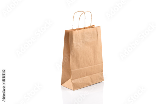 Paper shopping bag on white