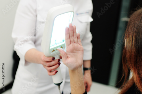 doctor spends psoriasis treatment using ultraviolet lamps and phototherapy. Skin diseases  eczema  dermatitis  shingles  peeling
