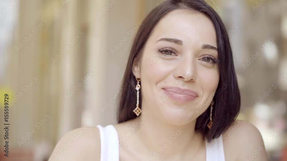 Portrait of young beautiful girl Georgian women, Winks the eye to the camera. Portrait of young beautiful girl Georgian women, Winks the eye to the camera.