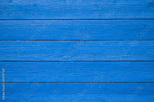 Blue painted wooden planks background texture.