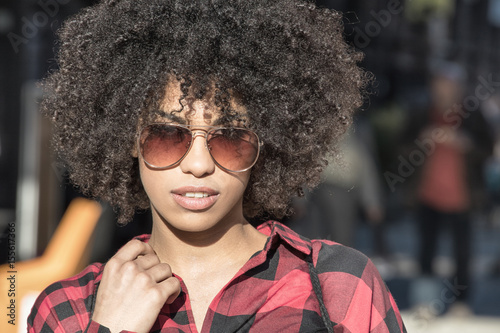 Girl with afro hairstyle.