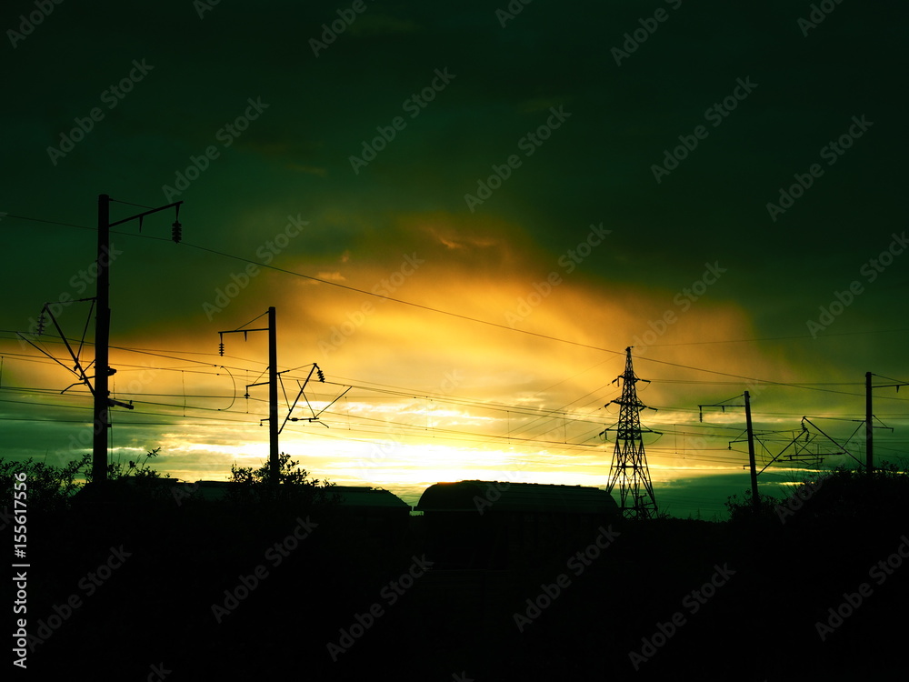 Obraz premium Railroad freight cars. Beautiful sunrise.