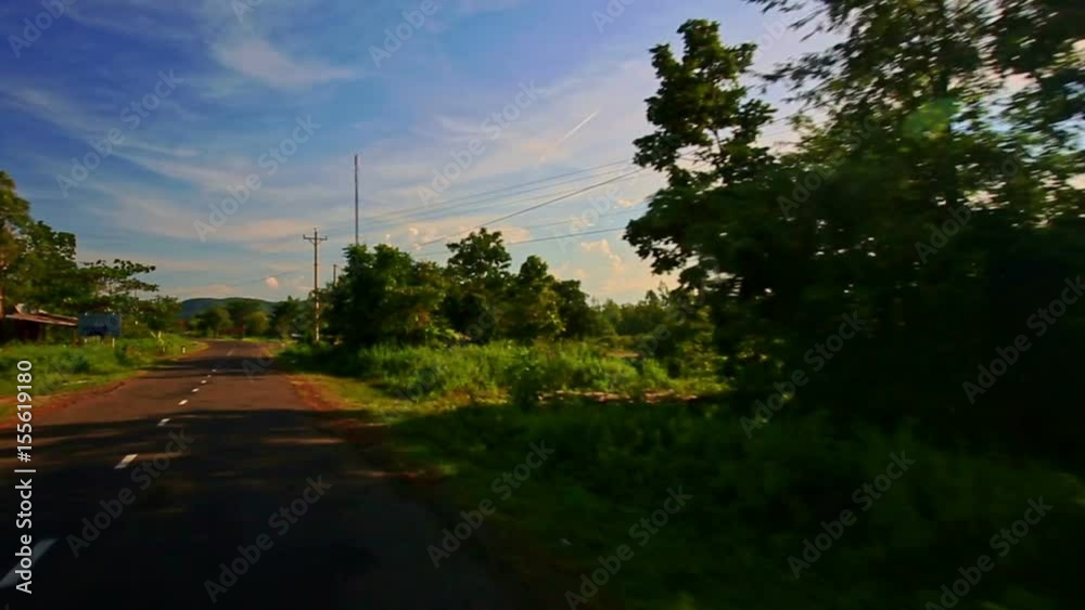 Camera Moves along Shady Sunny Road among Rural Landscape Camera Moves along Shady Sunny Road among Rural Landscape