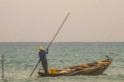 Traditional Vietnamese fishing along the beautiful coastline of Vietnam