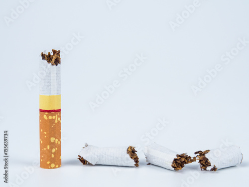 Broken cigarette on white background. World No Tobacco Day concept.