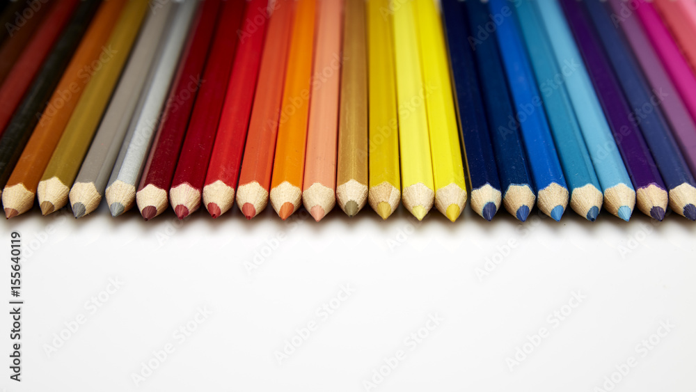 Many different colored pencils on white background Many different colored pencils on white background