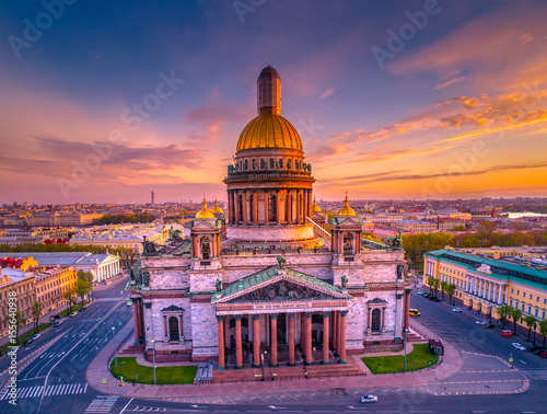 Saint Isaac's Cathedral. St. Petersburg. View from Issakievskaya square. The city is in the sunshine. Sunrise. photo
