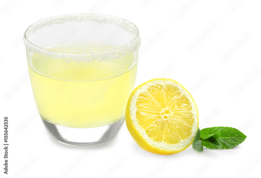 Delicious lemon juice in glass on white background Delicious lemon juice in glass on white background