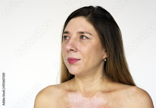 Woman bare chest naked smiling studio portrait