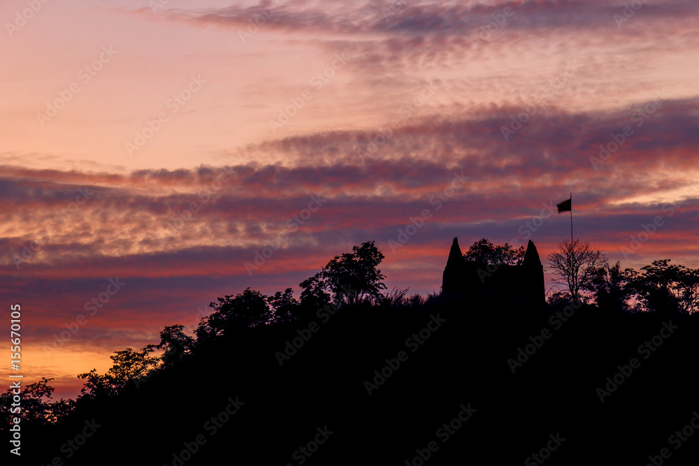 Silhouette temple on the mountain hill with twilight  cloudy sky background landscape