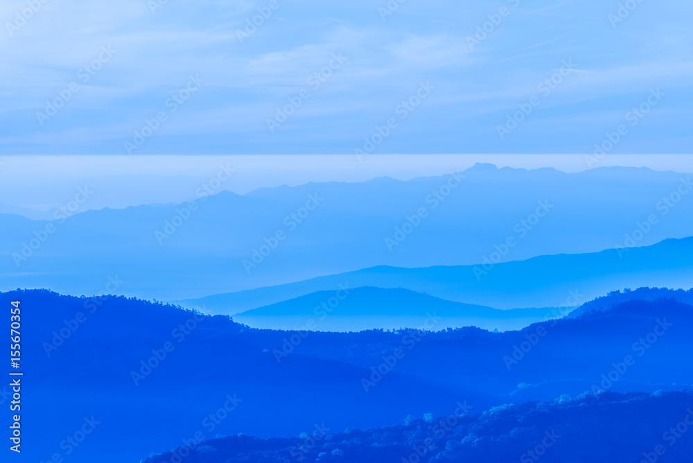 Blue mountains layers during sunrise